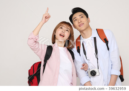 Happy young traveler couple concept photo. set out on a trip to honeymoon, camping and summer vacation concept isolated on white background. 186 Happy young traveler couple concept photo. set out on a trip to honeymoon, camping and summer vacation concept isolated on white background. 186 39632959