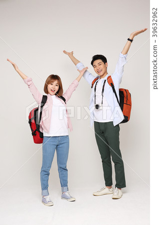 Happy young traveler couple concept photo. set out on a trip to honeymoon, camping and summer vacation concept isolated on white background. 184 Happy young traveler couple concept photo. set out on a trip to honeymoon, camping and summer vacation concept isolated on white background. 184 39632962