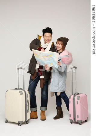 Happy young traveler couple concept photo. set out on a trip to honeymoon, camping and summer vacation concept isolated on white background. 340 Happy young traveler couple concept photo. set out on a trip to honeymoon, camping and summer vacation concept isolated on white background. 340 39632963