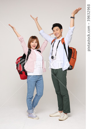 Happy young traveler couple concept photo. set out on a trip to honeymoon, camping and summer vacation concept isolated on white background. 183 Happy young traveler couple concept photo. set out on a trip to honeymoon, camping and summer vacation concept isolated on white background. 183 39632968