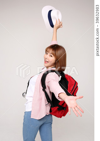 Young traveler woman with a backpack concept isolated on White photo. 018 Young traveler woman with a backpack concept isolated on White photo. 018 39632983