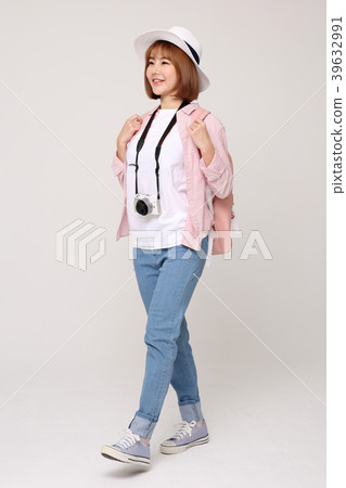 Young traveler woman with a backpack concept isolated on White photo. 005 Young traveler woman with a backpack concept isolated on White photo. 005 39632991