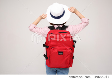 Young traveler woman with a backpack concept isolated on White photo. 012 Young traveler woman with a backpack concept isolated on White photo. 012 39633017