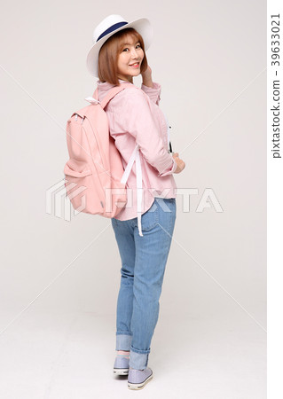 Young traveler woman with a backpack concept isolated on White photo. 007 Young traveler woman with a backpack concept isolated on White photo. 007 39633021