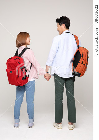 Happy young traveler couple concept photo. set out on a trip to honeymoon, camping and summer vacation concept isolated on white background. 160 Happy young traveler couple concept photo. set out on a trip to honeymoon, camping and summer vacation concept isolated on white background. 160 39633022