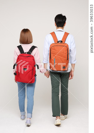 Happy young traveler couple concept photo. set out on a trip to honeymoon, camping and summer vacation concept isolated on white background. 158 Happy young traveler couple concept photo. set out on a trip to honeymoon, camping and summer vacation concept isolated on white background. 158 39633033