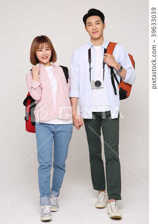 Happy young traveler couple concept photo. set out on a trip to honeymoon, camping and summer vacation concept isolated on white background. 148 Happy young traveler couple concept photo. set out on a trip to honeymoon, camping and summer vacation concept isolated on white background. 148 39633039