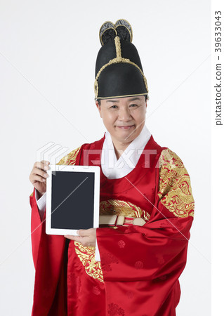 A middle-aged man who dressed a king's clothes making funny expression photo. 350 A middle-aged man who dressed a king's clothes making funny expression photo. 350 39633043