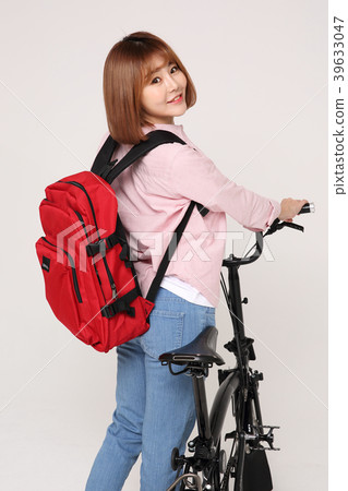 Young traveler woman with a backpack concept isolated on White photo. 143 Young traveler woman with a backpack concept isolated on White photo. 143 39633047