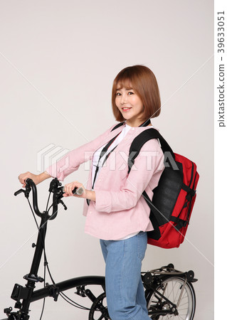 Young traveler woman with a backpack concept isolated on White photo. 137 Young traveler woman with a backpack concept isolated on White photo. 137 39633051