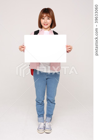Young traveler woman with a backpack concept isolated on White photo. 131 Young traveler woman with a backpack concept isolated on White photo. 131 39633060