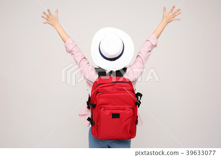 Young traveler woman with a backpack concept isolated on White photo. 013 Young traveler woman with a backpack concept isolated on White photo. 013 39633077