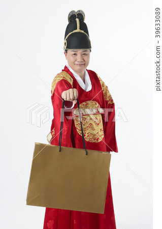 A middle-aged man who dressed a king's clothes making funny expression photo. 326 A middle-aged man who dressed a king's clothes making funny expression photo. 326 39633089