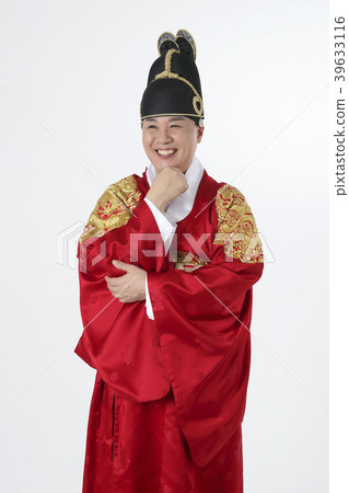 A middle-aged man who dressed a king's clothes making funny expression photo. 293 39633116