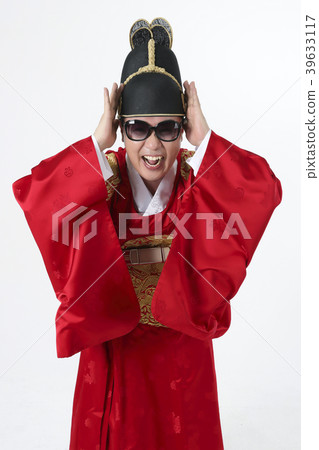 A middle-aged man who dressed a king's clothes making funny expression photo. 381 A middle-aged man who dressed a king's clothes making funny expression photo. 381 39633117