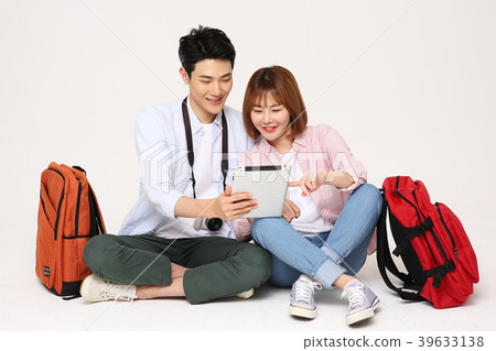 Happy young traveler couple concept photo. set out on a trip to honeymoon, camping and summer vacation concept isolated on white background. 208 Happy young traveler couple concept photo. set out on a trip to honeymoon, camping and summer vacation concept isolated on white background. 208 39633138