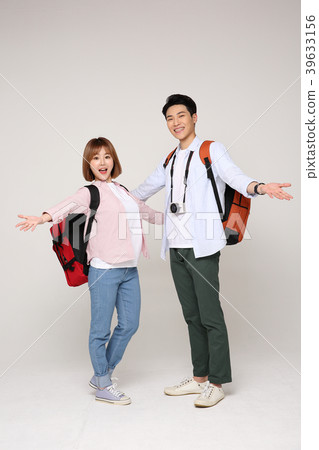 Happy young traveler couple concept photo. set out on a trip to honeymoon, camping and summer vacation concept isolated on white background. 182 Happy young traveler couple concept photo. set out on a trip to honeymoon, camping and summer vacation concept isolated on white background. 182 39633156