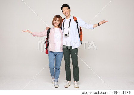 Happy young traveler couple concept photo. set out on a trip to honeymoon, camping and summer vacation concept isolated on white background. 164 Happy young traveler couple concept photo. set out on a trip to honeymoon, camping and summer vacation concept isolated on white background. 164 39633176
