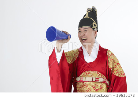 A middle-aged man who dressed a king's clothes making funny expression photo. 367 39633178