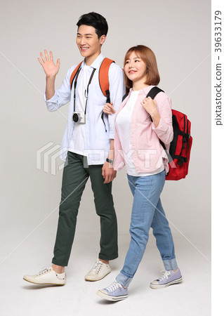 Happy young traveler couple concept photo. set out on a trip to honeymoon, camping and summer vacation concept isolated on white background. 156 Happy young traveler couple concept photo. set out on a trip to honeymoon, camping and summer vacation concept isolated on white background. 156 39633179