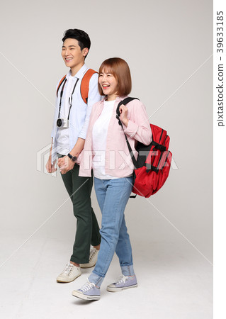 Happy young traveler couple concept photo. set out on a trip to honeymoon, camping and summer vacation concept isolated on white background. 153 Happy young traveler couple concept photo. set out on a trip to honeymoon, camping and summer vacation concept isolated on white background. 153 39633185