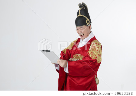 A middle-aged man who dressed a king's clothes making funny expression photo. 353 39633188