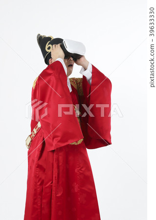 A middle-aged man who dressed a king's clothes making funny expression photo. 397 A middle-aged man who dressed a king's clothes making funny expression photo. 397 39633330