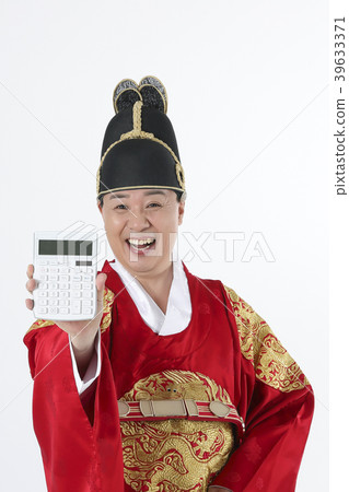 A middle-aged man who dressed a king's clothes making funny expression photo. 365 39633371