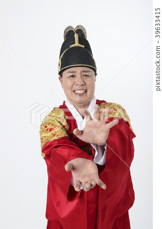 A middle-aged man who dressed a king's clothes making funny expression photo. 312 A middle-aged man who dressed a king's clothes making funny expression photo. 312 39633415
