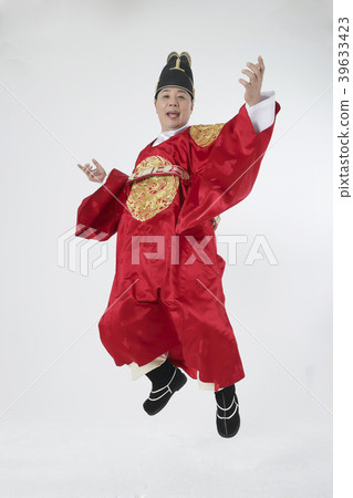 A middle-aged man who dressed a king's clothes making funny expression photo. 305 39633423