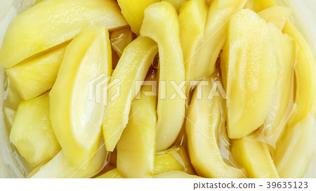 Close up of Thai pickled mangoes in a bowl. 39635123