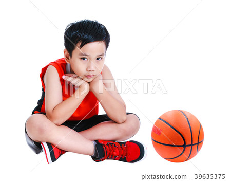 Unhappy asian child sit near basketball. Isolated Unhappy asian child sit near basketball. Isolated 39635375