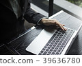 Gray laptop on table top-down view  home office 39636780