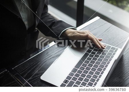Gray laptop on table top-down view  home office 39636780