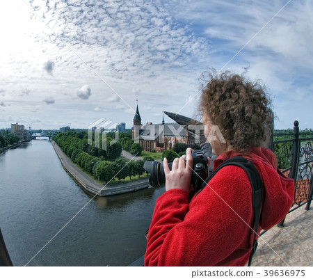 Woman and historical center in Kaliningrad. Russia Woman and historical center in Kaliningrad. Russia 39636975