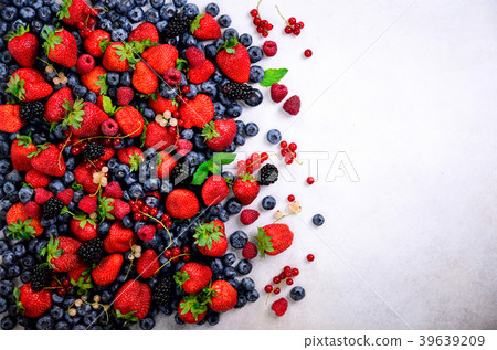 Assortment of strawberry, blueberry, currant, mint 39639209