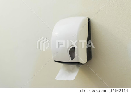 Paper towel dispenser on the wall in the bathroom Paper towel dispenser on the wall in the bathroom 39642114