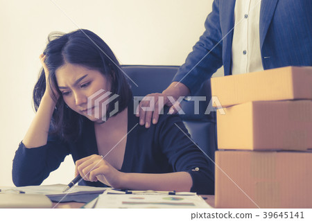 Kind boss is helping and consolate an upset wroker 39645141
