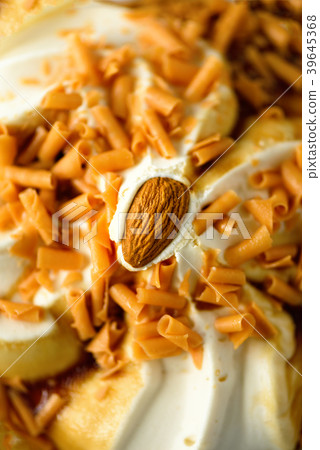 Ice cream with caramel sauce and almond. Summer Ice cream with caramel sauce and almond. Summer 39645368