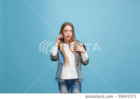 Beautiful teen girl looking suprised isolated on Beautiful teen girl looking suprised isolated on 39645371