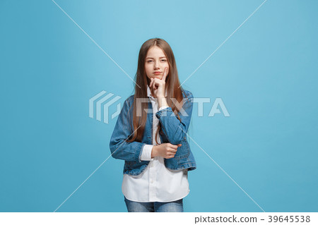 Young serious thoughtful teen girl. Doubt concept. Young serious thoughtful teen girl. Doubt concept. 39645538