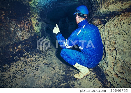 Man in dark old tunnel. Bastion passage under city 39646765