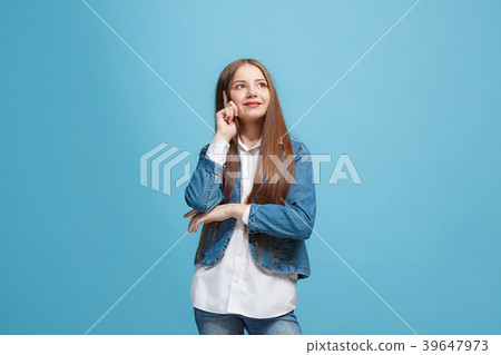 Young serious thoughtful teen girl. Doubt concept. Young serious thoughtful teen girl. Doubt concept. 39647973
