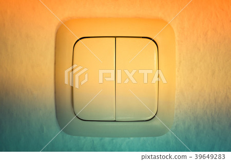Light switch closeup with yellow green gradient Light switch closeup with yellow green gradient 39649283