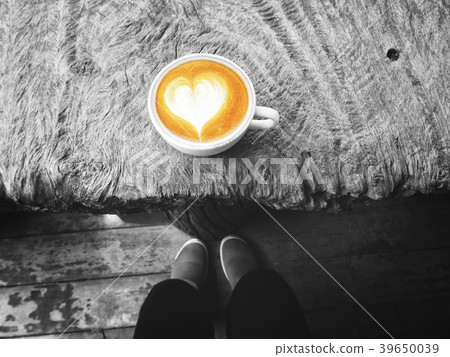 Selfie of latte art coffee on shoes Selfie of latte art coffee on shoes 39650039