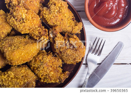Tasty fried chicken wings 39650365
