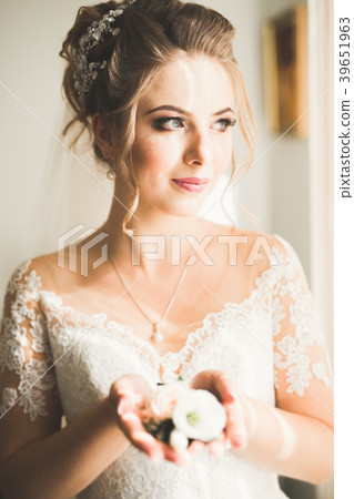 Portrait of beautiful bride with fashion veil at Portrait of beautiful bride with fashion veil at 39651963