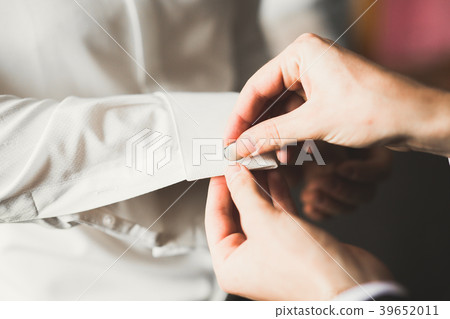 Young handsome man relaxing at his apartment in a 39652011