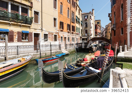 Typical view of gondolas and boats on the canal of Typical view of gondolas and boats on the canal of 39652415