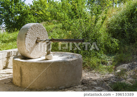 The millstone, olive oil press The millstone, olive oil press 39653389
